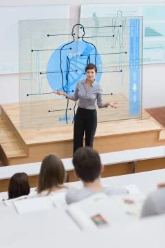 Standing teacher in front of futuristic interface asking a question Illustrazione stock