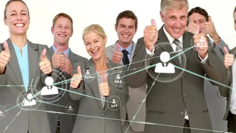 Standing team in suits holding thumbs-up on white backdrop as network overlay Stock Footage 333830125