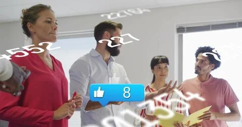 Standing team in work clothes discussing in room with red marker, yellow Stock Photos