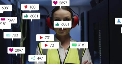 Standing tech wearing red ear protectors and neon vest in data center, Vídeos de archivo 331833004