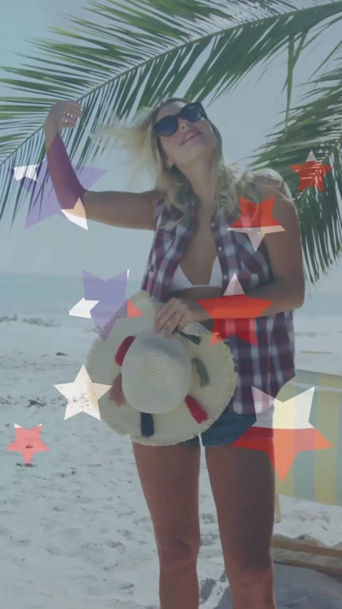 Standing under palm tree on beach, woman holding hat, summer vacation animation Stock Footage 342813049