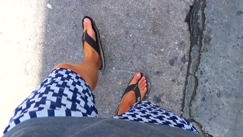 Standing walking on street ground floor with flip flops Thailand. Stock Footage 318944016
