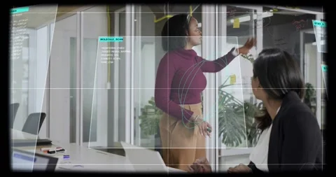 Standing woman picking up marker and facing glass, activating MOLECULE_SCAN HUD, Stock Footage 334308662