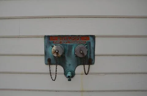 Standpipe fire department connection on side of building Stock Photos