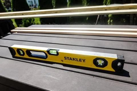 A Stanley level is seen at a construction site Stock Photos