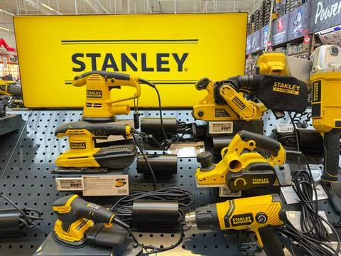 Stanley power tools displayed inside hardware store. Stock Photos