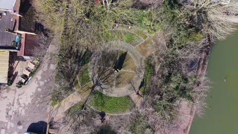 Stanstead Abbots monument drone orbit above River Lee and High Road Stock Footage 331081152