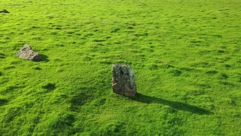 Stanton Drew Stone Circle 4K Drone Circling One Stone with Shadows, Somerset Stock Footage 162762701