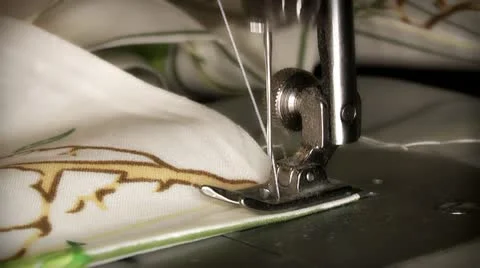 Staple the edge of the sheets on the sewing machine Stock Footage 16320681