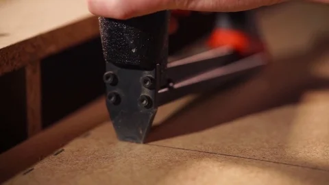 Staple gun usage in the carpentry workshop Stock Footage 85422013