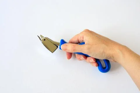 Staple remover tool isolated on white canvas background Stock Photos