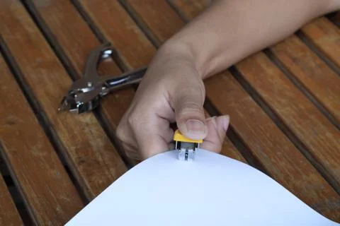 Stapler for binding sheets of paper. 스톡 사진