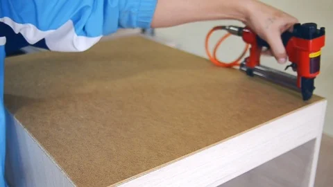 Stapler nailed hardboard Stock Footage 69818668