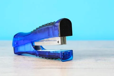 Stapler for office work on the table. Stationery item. Office su Stock Photos