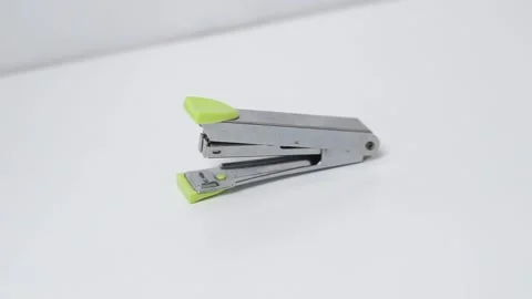 The stapler is photographed on a white background Video stock 272713580