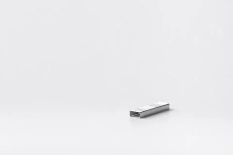 Stapler staples isolated on a white background. Close-up. Copy space. Space f Stock Photos