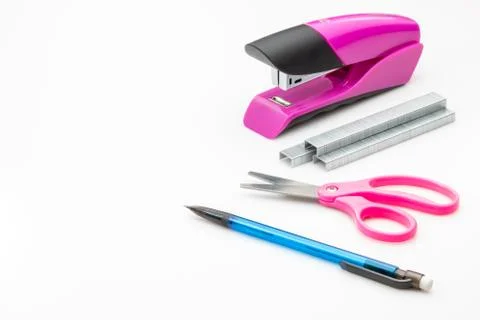 Stapler, staples, scissors and mechanical pencil. Stock Photos
