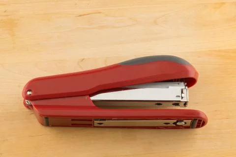 Stapler for stapling papers on a table Stock Photos