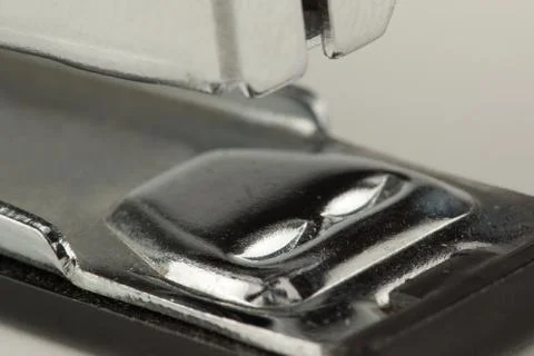 Stapler for stapling papers on a table Stock Photos