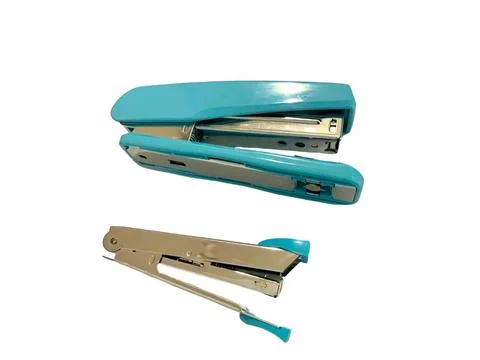 The stapler tool is blue on a white background Stock Photos