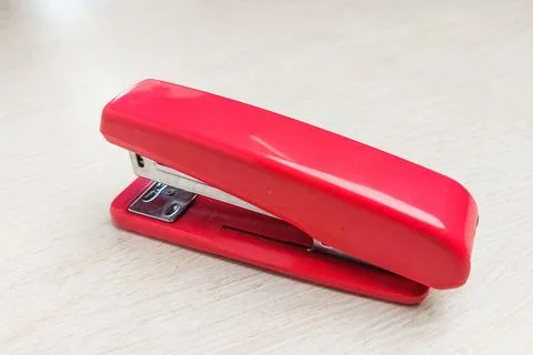 Stapler on a white desk. Stock Photos