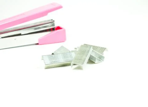 Staples and stapler on white background Stock Photos