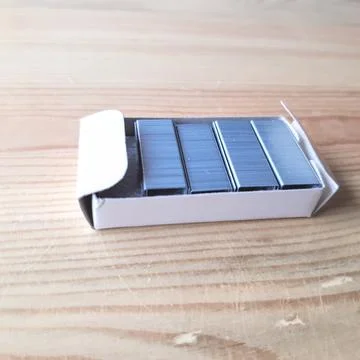 Staples in a box Stock Photos