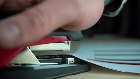 Stapling paper, closeup of man hands in office Stock Footage 159482051