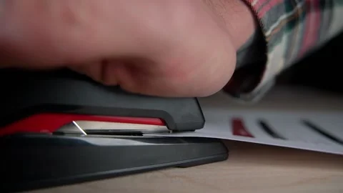 Stapling paper, closeup of man hands in office Stock Footage 159482454