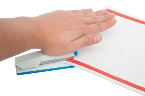 Stapling papers with stapler isolated on white Stock Photos