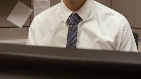 Star Employee working hard, sitting behind a monitor. Stock Footage 79237502