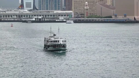Star ferry crosses the harbor, medium close-up Stock Footage 72846755