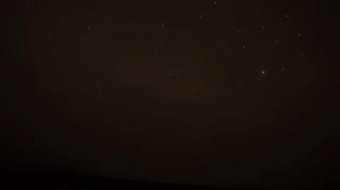 Star filled night sky viewed through clouds Stock Footage 63296375