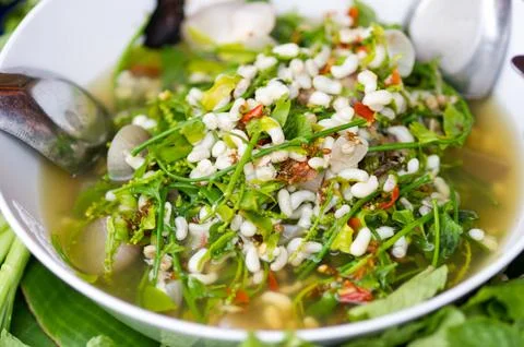Star gooseberry and red ant eggs curry Stock Photos