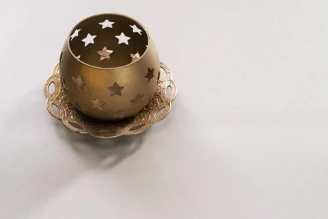 Star Pattern Brass Tea Candle Holder with tray Stock Photos