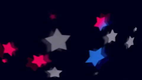 Star shape bokeh with glowing red, white, and blue color Video stock 336979050