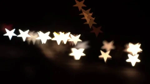 Star shaped bokeh of car lights at night. Stock Footage 80959290