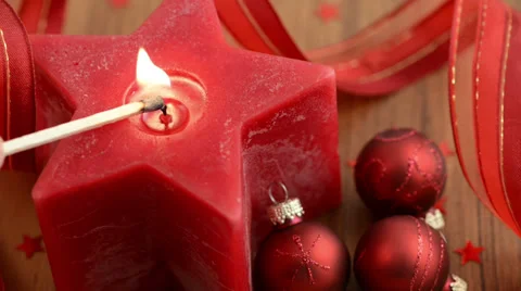 Star-shaped candle set fire 스톡 동영상 32382009