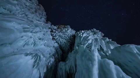 Star sky rotating above ice at night Stock Footage 75628196
