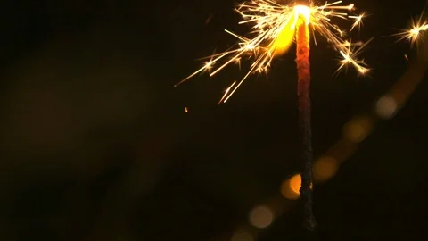 Star Splashes on christmas tree, dark background and Slow motion pyrotechnics Stock Footage 126989191