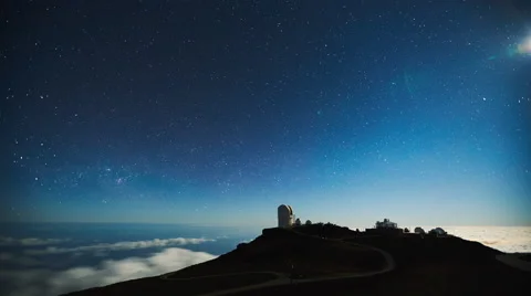 Star time lapse, milky way galaxy moving across the night sky above observatory Stock Footage 62764133