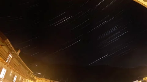 Star trail in the black sky on a winter night Stock Footage 334863666