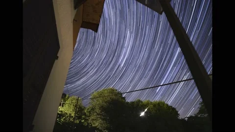 Star trail comet effect from home balcony Stock Footage 137790835