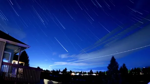 Star trails and clouds timelapse over boundary Video stock 275460648