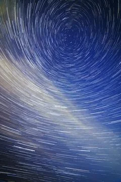 Star Trails Creating Spiral Pattern in Night Sky Stock Photos