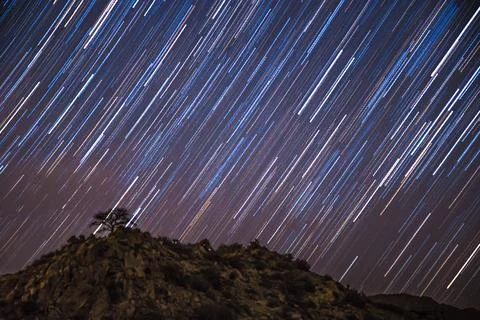 Star Trails into the Mountain 스톡 사진