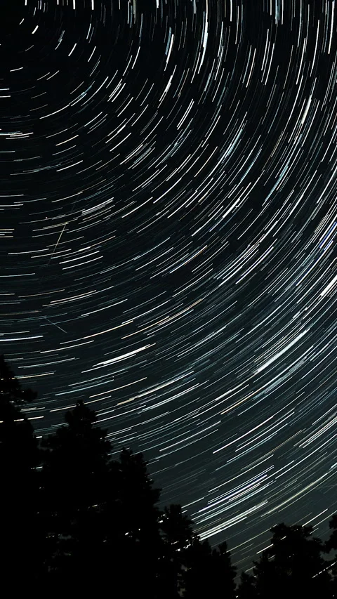 Star trails in the night sky Stock Footage 276094645
