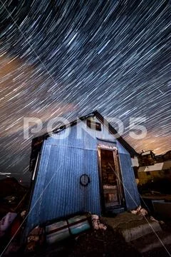 Star trails in old mining town Stock Photos