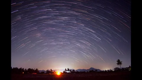 Star Trails Over Mountain Landscape – Magical Night Timelapse Stock Footage 313558561