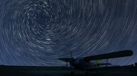 Star Trails Time lapse Beautiful night sky, Spiral Star trails over small airpor Stock Footage 54074910
